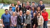 Members of the Sykes Lab pose for a group photo outdoors